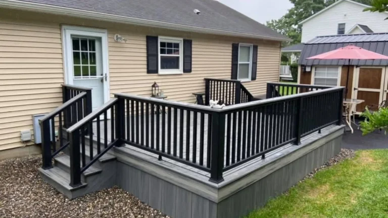 new-grey-decking-black-railings-southworth-contracting